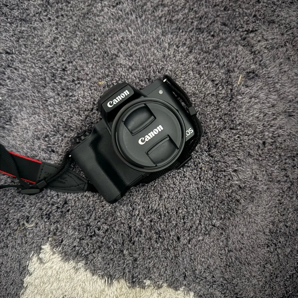 Canon Black DSLR Camera with Strap